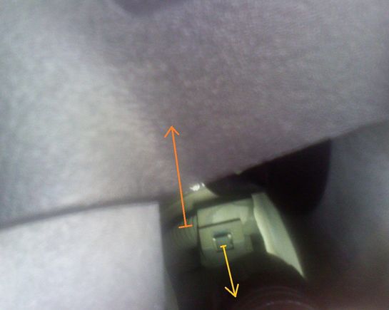 Pull the tab with a stiff wire hook and pry the cable up with long screwdriver