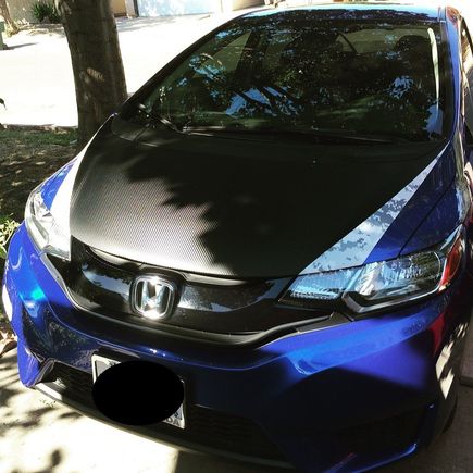 Carbon and Digi-Camo wrapped the hood. Carbon wrapped the spoiler, too.