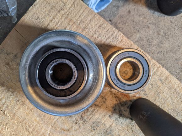 Here's a side-by side with the new bearing installed, verifying fitment. Numbers are visible. Timken 6203-2RS fits and operates within the desired RPM range, nod to OP for figuring out what that is.