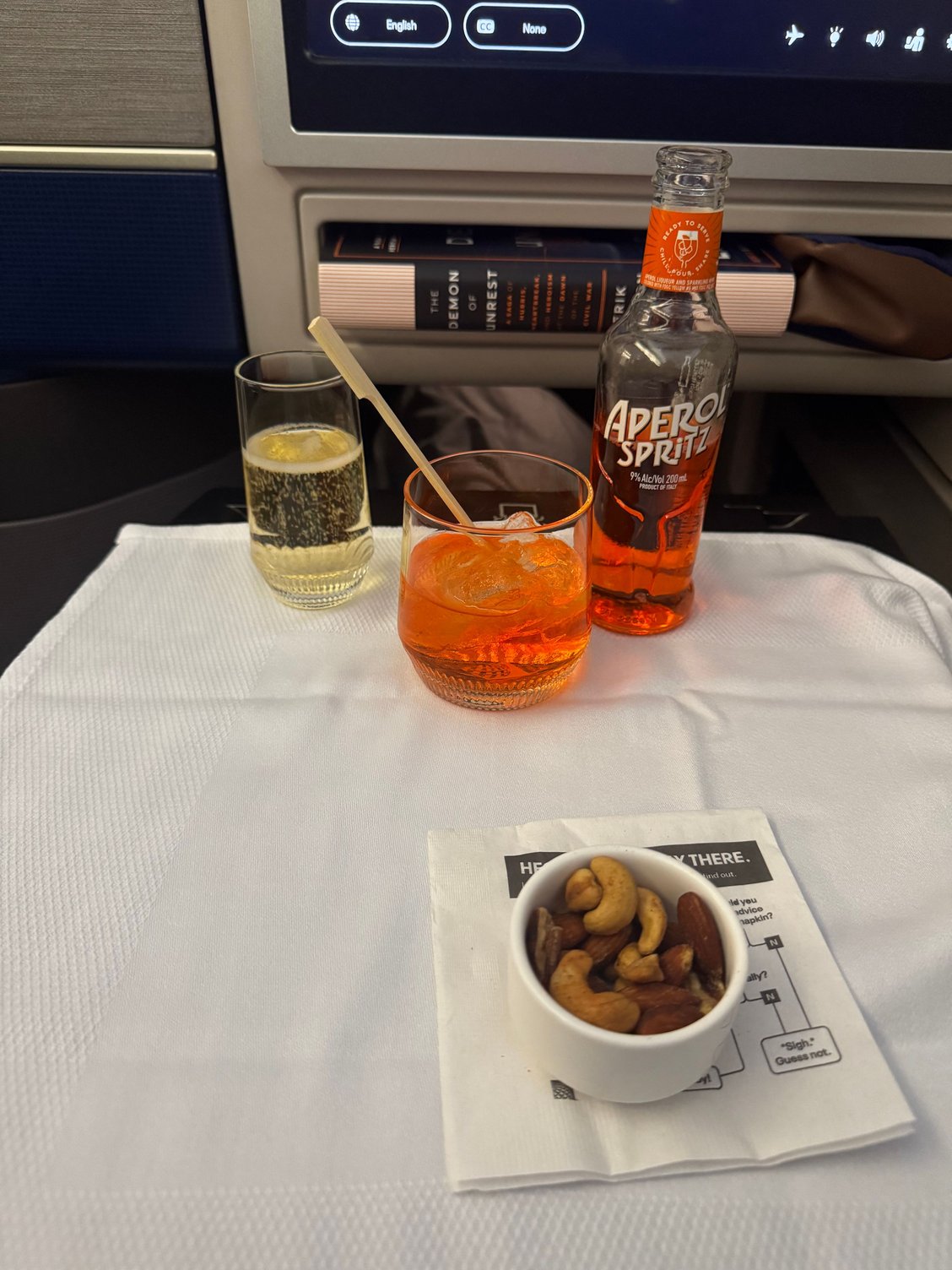 Aperol spritz. Diane suggested I add champagne to taste to cut the sweetness. I agree it made it much better. 