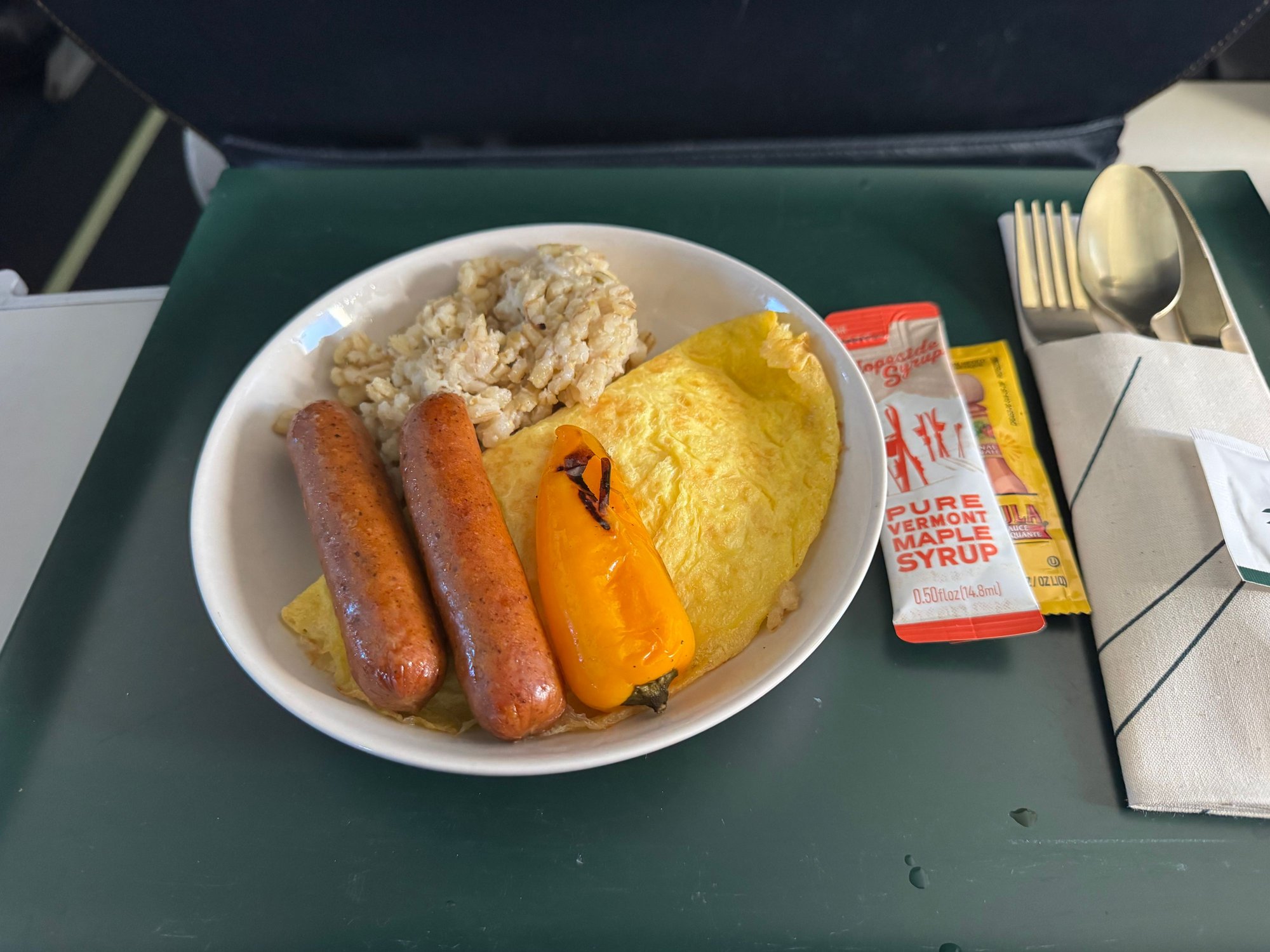 Jack cheese omelette and sausages. 