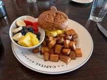 Bacon egg and cheese sandwich with fruit