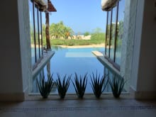 View from entrance foyer. That’s aloe in the foreground growing inside the villa. LOVE this brilliant design touch.