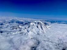 Mt Rainier above the clouds. SEA-AUS.