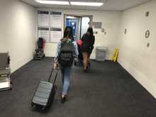 The gal in front of me and I decided - what the heck!! and we boarded in the confusion with the "pre-boarding" PAX's. 