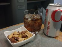 Diet Coke and warm nuts