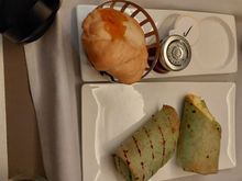 My wife's VLML breakfast. The wrap might have been the same as the onboard veggie main of scranbles egg wrap with green peppers.  The wrap was warm/ toasted.

