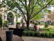 Sitting at the outdoor patio bar