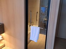 The bathroom and the wetroom with separate bath and shower ( no rainhead  shower). The toilet is in a separate room across the hall