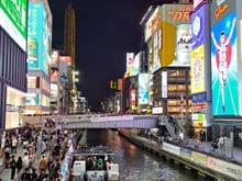 Dotonbori  on a Friday night with canal cruise boats