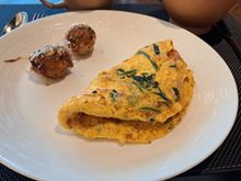 Omelet ( well done as i asked) and fried octopus at breakfast