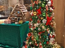 Christmas tree and gingerbread house in Forest Garden