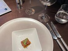 Amuse bouche: flatbread with prosciutto and Gorgonzola 