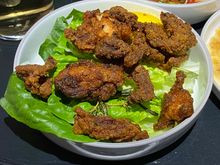 TUSCAN FRIED CHICKEN SALAD with little gems (lettuce), lemon, and chili flakes.  There is a nice little sauce under the lettuce.  The chicken was crunchy and flavorful!!  Went well with the lettuce when you dipped into the sauce under the bed of lettuce!  The chicken smelled really good as the meals were being served in the Mint cabin.


