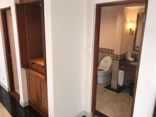 The extra toilet next to living room 