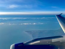 Heading east towards Dover; Dungeness just above the engine and France in the distance 