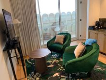Seating area with coffee maker and a free mini bar
