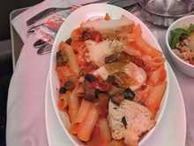Entree of penne with red sauce and chicken.  Decent taste but a little dry.