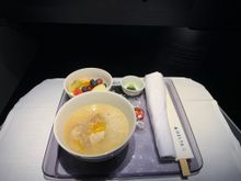 Mid-flight snack of sea bream congee/porridge; other choice was a teriyaki chicken burger