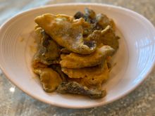 Crispy fish skin with salted egg coat