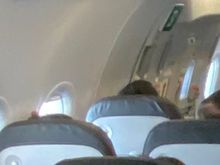 It’s hard to see and I have no better photo. But the full window is in Row 28 behind. 