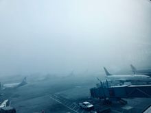 Karl the Fog delaying flights. SFO Sky Club.  
