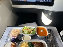 One tray dinner with main, salad, soup, bread and dessert; choice of three main dishes: beef, chicken, pasta