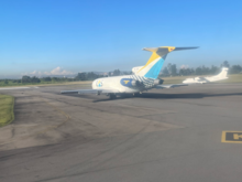 A Boeing 727 taxing ahead of us