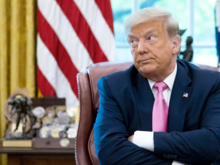 Authoritarian  with the crossed arms pose to make himself  look bigger