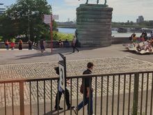 Just as you enter the station, before crossing the Rhine
