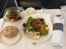 Starter salad and side salad.. Note the teeth breaking artichoke. Bread was served warm. 