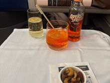 Aperol spritz. Diane suggested I add champagne to taste to cut the sweetness. I agree it made it much better. 