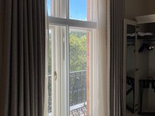 If on the bed one can see the trees + bit green of Russel Square park