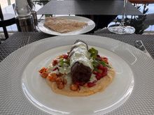 Lamb Kofta and flatbread- The lamb itself was a little dry and overcooked; almost like it had been in the oven a little too long. The accompaniments were really nice though. Not a patch on what you could get in the Middle East but not bad for a BA lounge in LHR. 