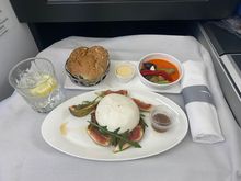 Nothing says classy as much as a ball of mozzarella and a plastic pot of glupp for dressing!