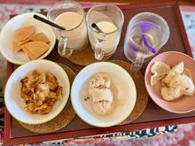 The fish keropok along with CNY love letters ( fan version ) , pain au chocolate chopped up , Daily Scoop kopi gao & cappuccino ice creams 