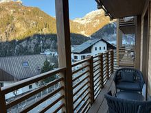 The balcony is large with seating for two. It is not visually private, since your neighbors can see you.