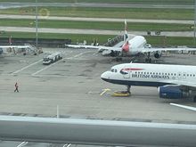 Just curious how long the robotic tugs have been in play at T5? Only one person guiding a plane out of gate now - didn’t there used to be 3?