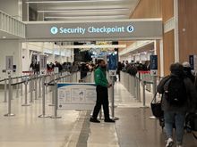 As you enter the checkpoint. Non-Pre/Clear is straight ahead. Premium lane to the far left.