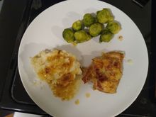 Marinated chicken, baked with ranch dressing and topped with cheese and bacon, plus mashed taters and veggies.