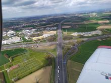 The interchange between the A44 (below) and the A4 - Aachen Flugplatz is in the background to the right of the A44