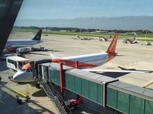 At the gate at Geneva airport with the Jura mountains in the background 