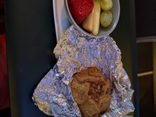 Breakfast pastry with fresh fruit. Warm cinnamon-apple pastry with a small side of fruit. Pastry was good, fruit was fine just a very small quantity.