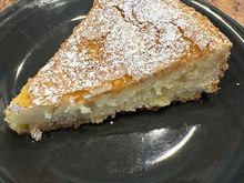 A slice of gooey lemon butter cake for dessert