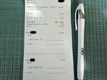Receipt of breakfast for 2 of the platinum “complimentary” breakfast, where the voucher removes the $44.00 charge, but are required to pay for the VAT charge of $4.40 and Gratuity of $7.92.