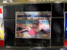 Senhor Selaron himself, immortalised on his steps