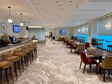 Secondary seating area, with another alcoholic bar and barista coffee