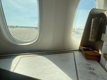 Row 8, you see 2nd window is at the back of the seat. Same for 7 