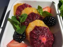 Fresh Fruit - citrus, blackberry, strawberry.  Obviously, it's 95% citrus, but at least they removed the seeds, which was most appreciated.