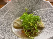 Cabbage rolls with local mushrooms in a chicken consomme
